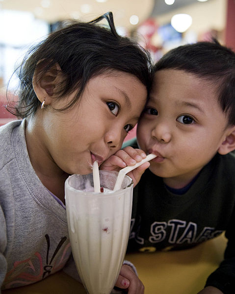 https://commons.wikimedia.org/wiki/File:Children_sharing_a_milkshake.jpg