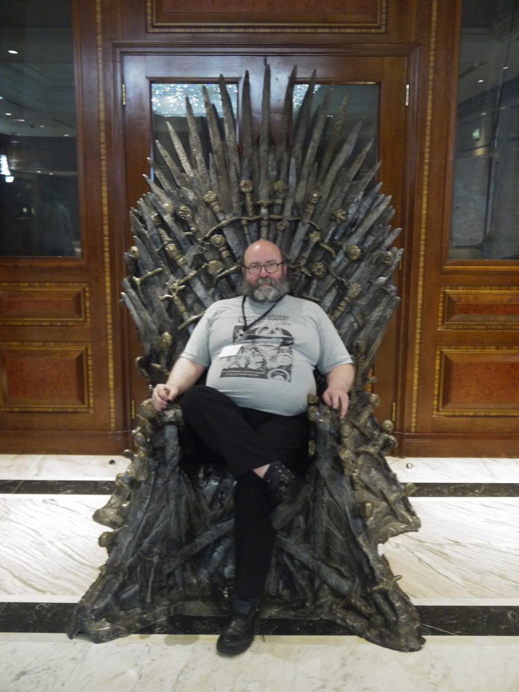 Photo taken by a convention guest in London - me in the Game Of Thrones chair 