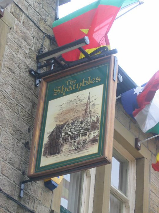 Photo taken by me – The Shambles pub sign, Dobcross, Saddleworth Photo taken by me – The Shambles pub sign, Dobcross, Saddleworth