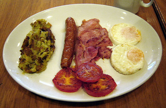 Bubble and Squeak with sausages, bacon and eggs - a "Full English" breakfast.