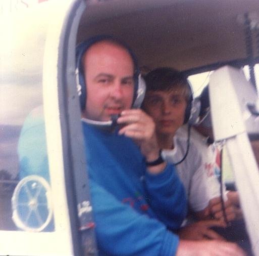 photo taken by a friend - me and another passenger on a helicopter