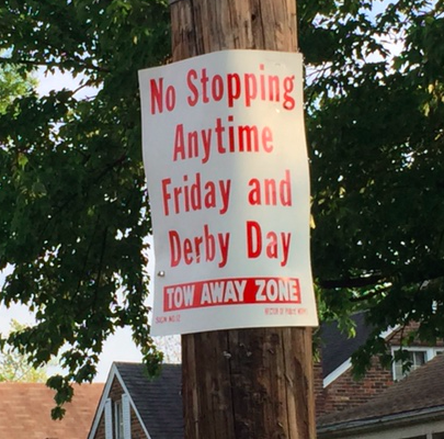 The signs prohibiting stopping on the streets around Churchill Downs.  Photo taken by and the property of FourWalls.