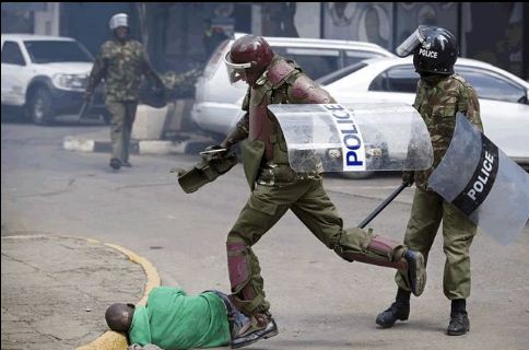 police beat up a man during the recent Nairobi demo police beat up a man during the recent Nairobi demo