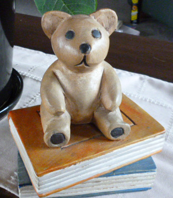 Teddy on books sits on my coffee table Teddy on books sits on my coffee table