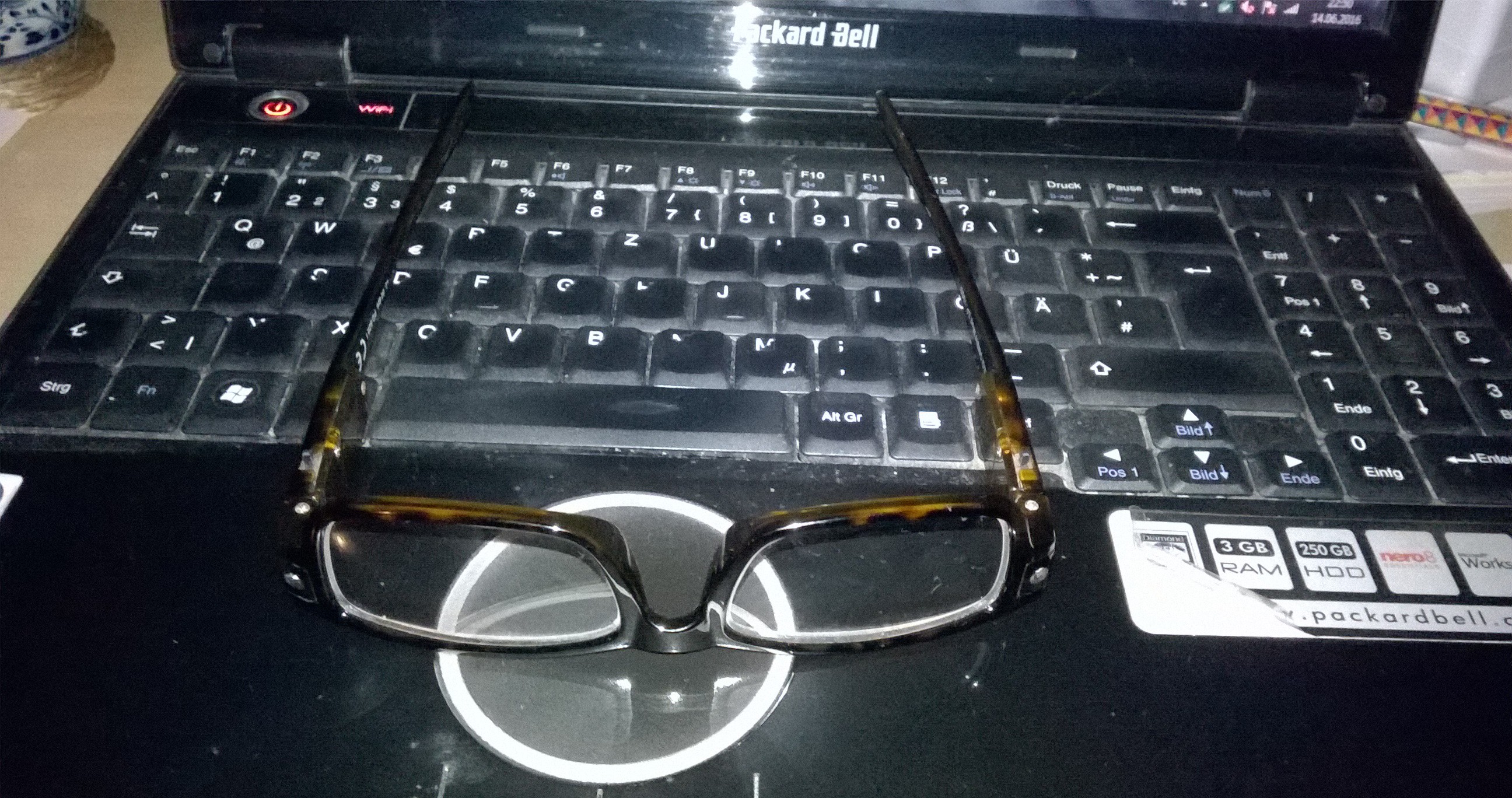 Reading Glasses w/ lights on an old laptop by thelme55