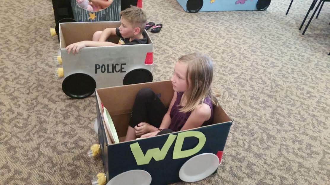 Willo and Jacob in the cars they made for drive in movie night.
