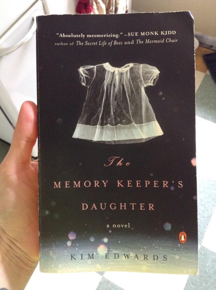 The book I was reading The Memory Keeper's Daughter by Kim Edwards