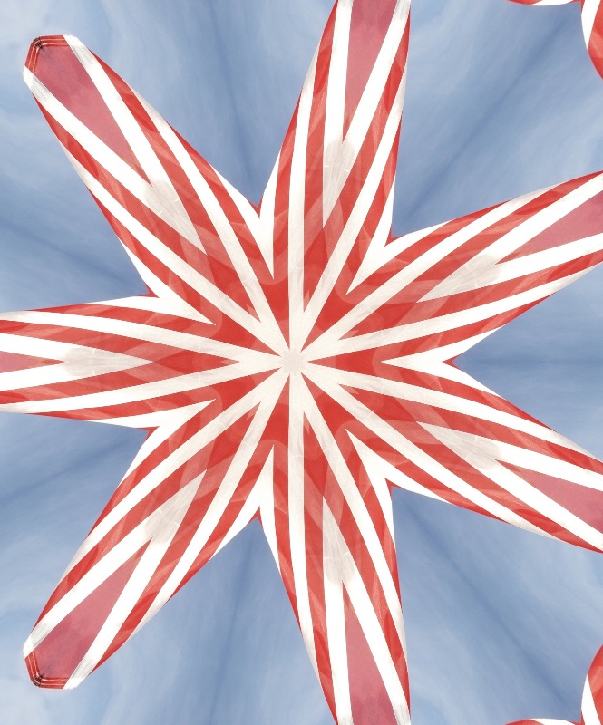 Photo I took of a flag with Kaleidoscope x7 effect on LunaPic.com