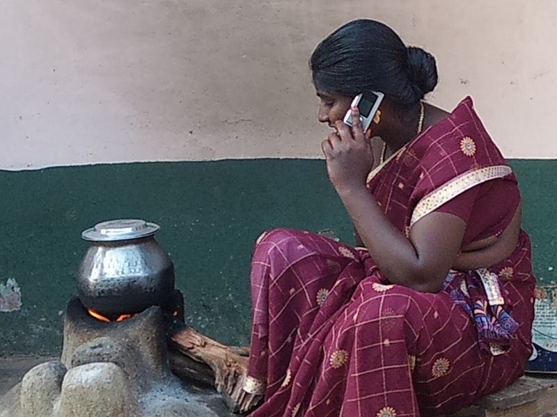 https://commons.wikimedia.org/wiki/File:Tamil_rural_woman_with_a_mobile_phone_facility.jpg