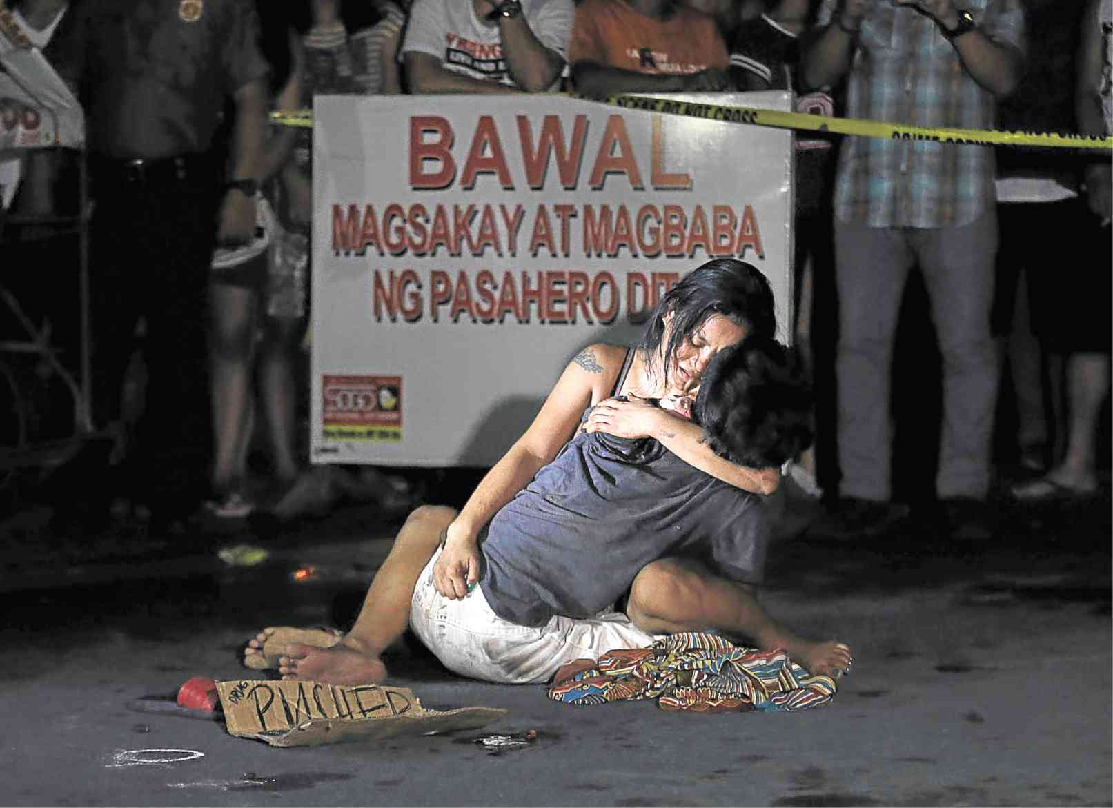 Photography by NOEL CELIS. Visually speaking I am so amazed of this Pieta Style portrait but still have sympathy with this couples because the man was only killed by unidentified gunman then just put the caption that he is a pusher. There is no assurance that he is suspected Drug addict. This crime happened near to our place where I live which is in Pasay City. I saw a comment that they are related to this person and he has no trace of Drugs. Yet he only work hard for his family they are really poorer than rats.