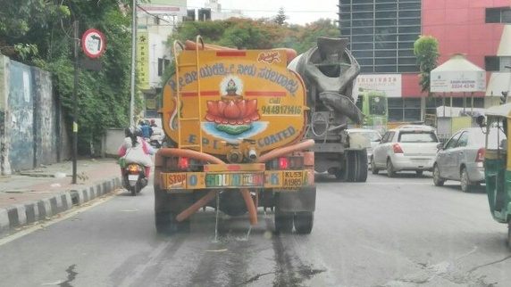 water pouring out from a water tanker 