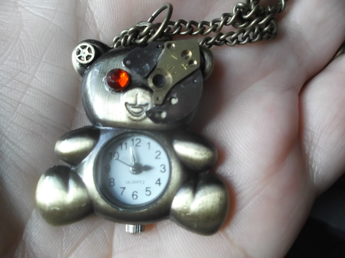 Clockwork/Steampunk bear watch/pendant I bought on Etsy--photo by me Clockwork/Steampunk bear watch/pendant I bought on Etsy--photo by me