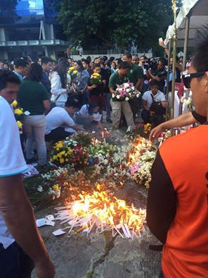 People in davao offer flowers to the bombed site