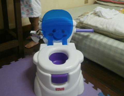 Cheer Me Potty that my kid is using for the potty training, this is Fisher Price.