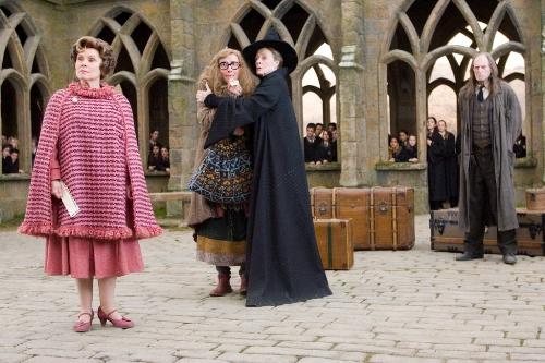 evil of prof umbridge - Imelda Staunton as Dolores Umbridge, Emma Thompson as Sybil Trelawney, Maggie Smith as Minerva McGonagal and David Bradley as Argus Filch. Harry Potter and the Order of the Phoenix  it is showing a photo of umbridge throwing of trelawney