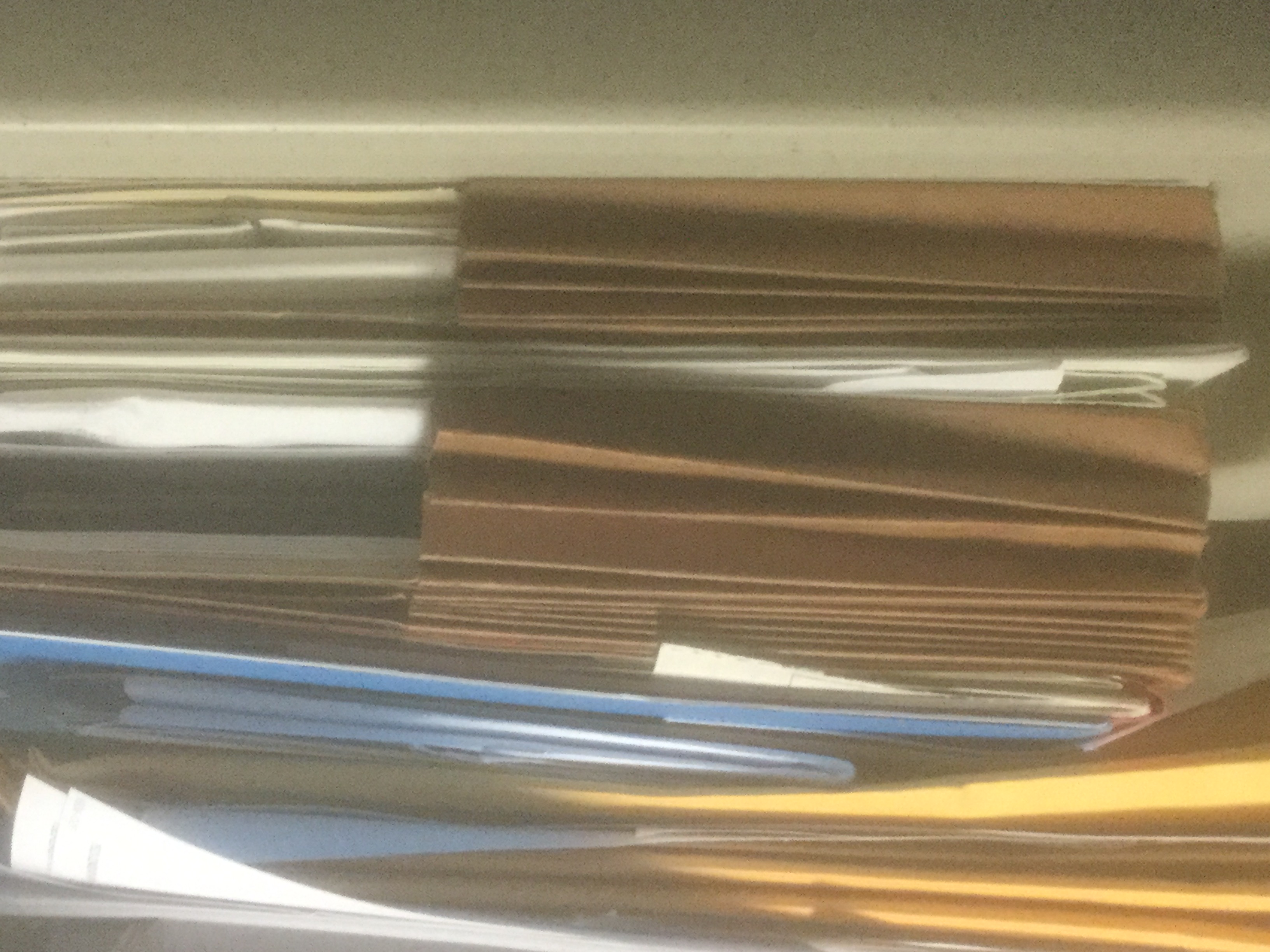 Stack of papers. Photo taken by and the property of FourWalls. Stack of papers. Photo taken by and the property of FourWalls.