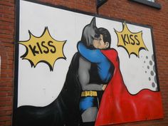 Photo taken by me – Superman and Batman kissing – wall mural in Manchester Photo taken by me – Superman and Batman kissing – wall mural in Manchester
