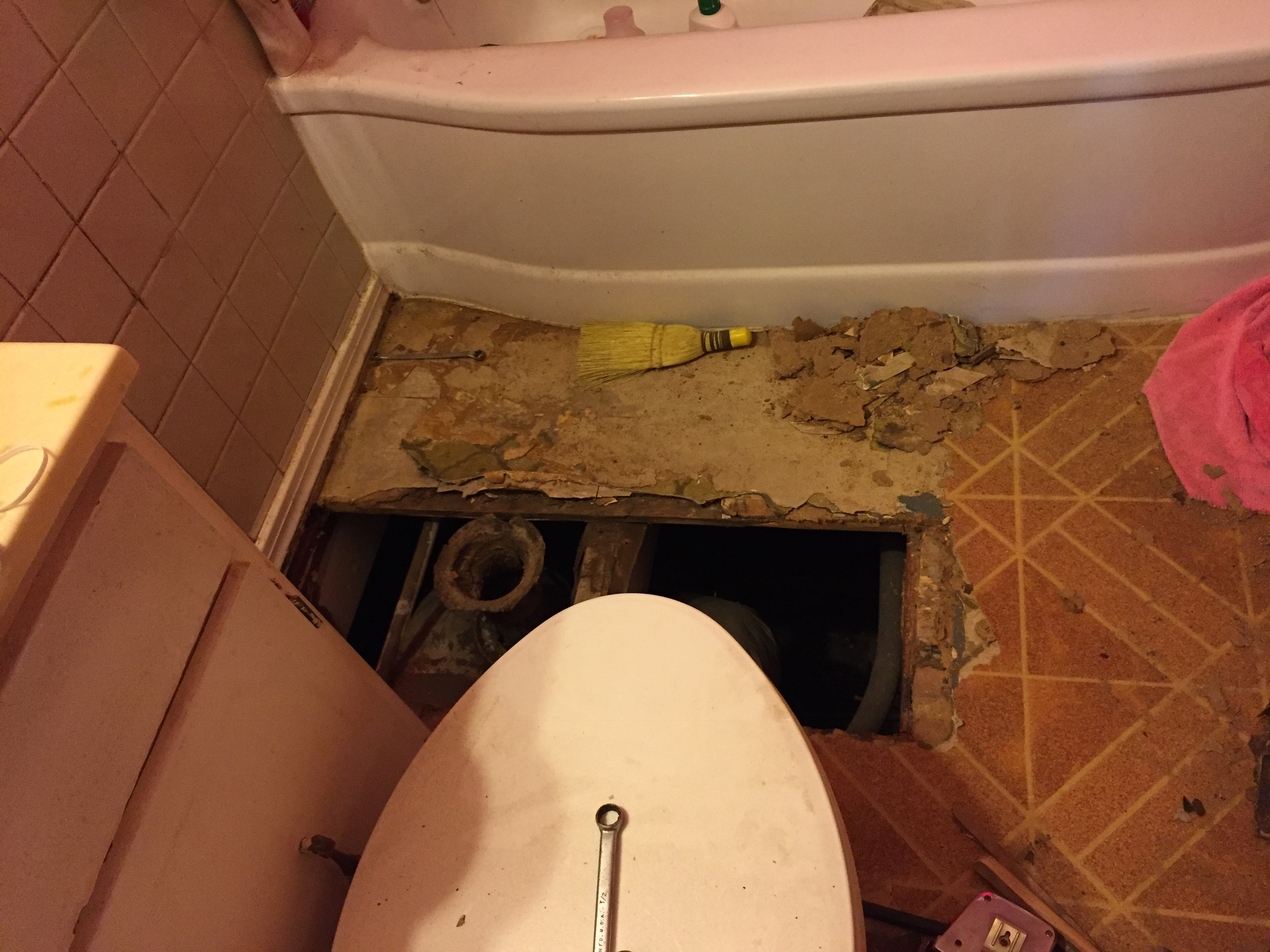 Bathroom under destruction. Photo taken by and the property of FourWalls. Bathroom under destruction. Photo taken by and the property of FourWalls.