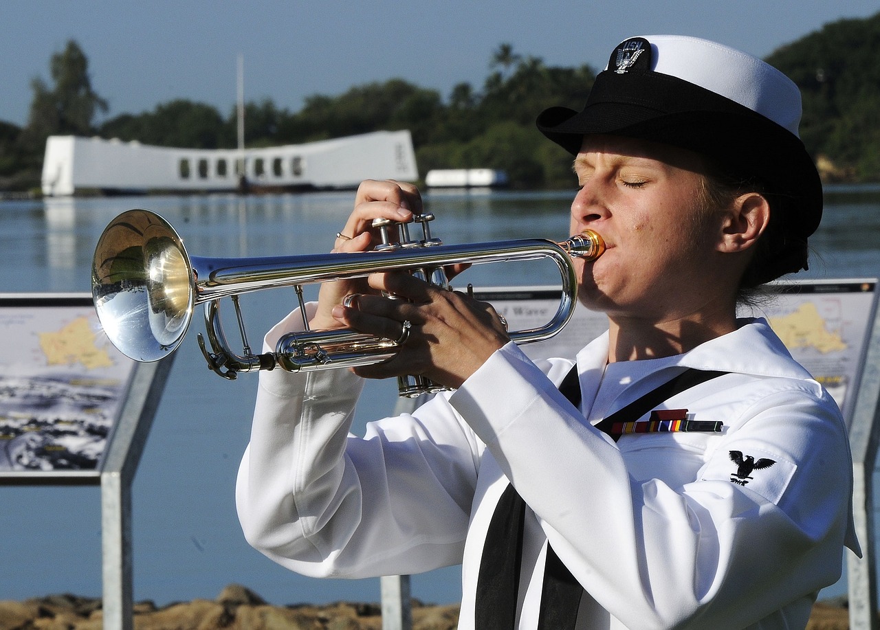 https://pixabay.com/en/trumpeter-playing-performance-music-922299/