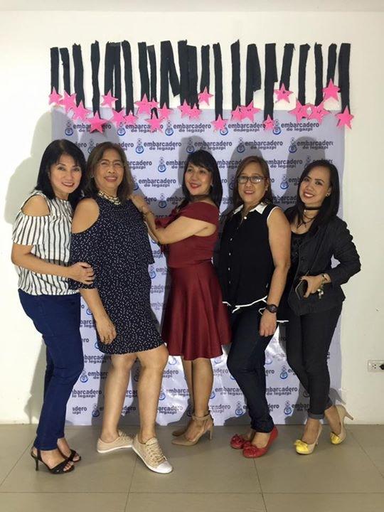 A picture taken during our Christmas Party with the two lady bosses (the ones in dresses) A picture taken during our Christmas Party with the two lady bosses (the ones in dresses)