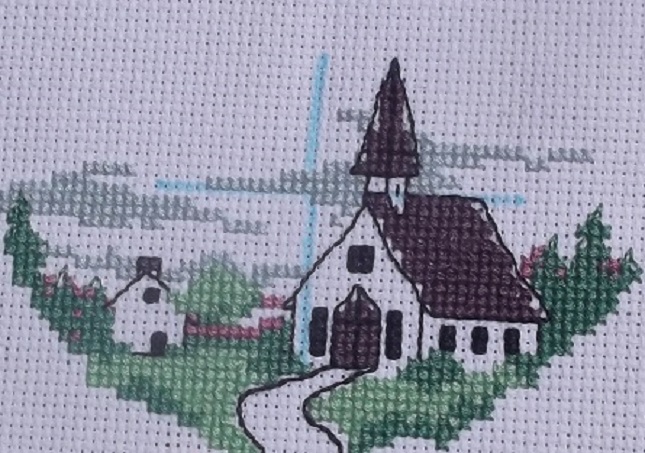 Counted cross stitch church done by me
