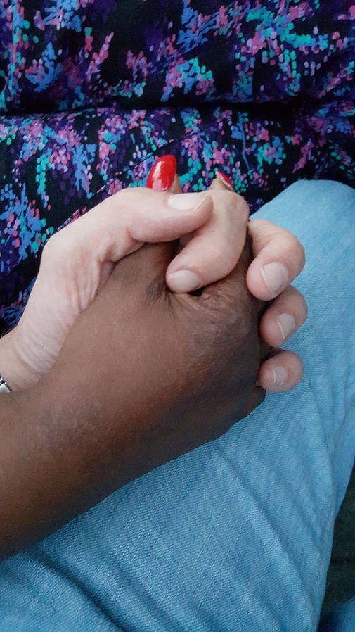 https://commons.wikimedia.org/wiki/File:Female_black_and_male_white_hand_(holding,_adult).jpg