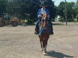 Andrew and Poco - Constume contest at our local fair for 4-h. He and his horse Poco recieved a blue ribbon for their effort. What was my son dressed as for the contest?