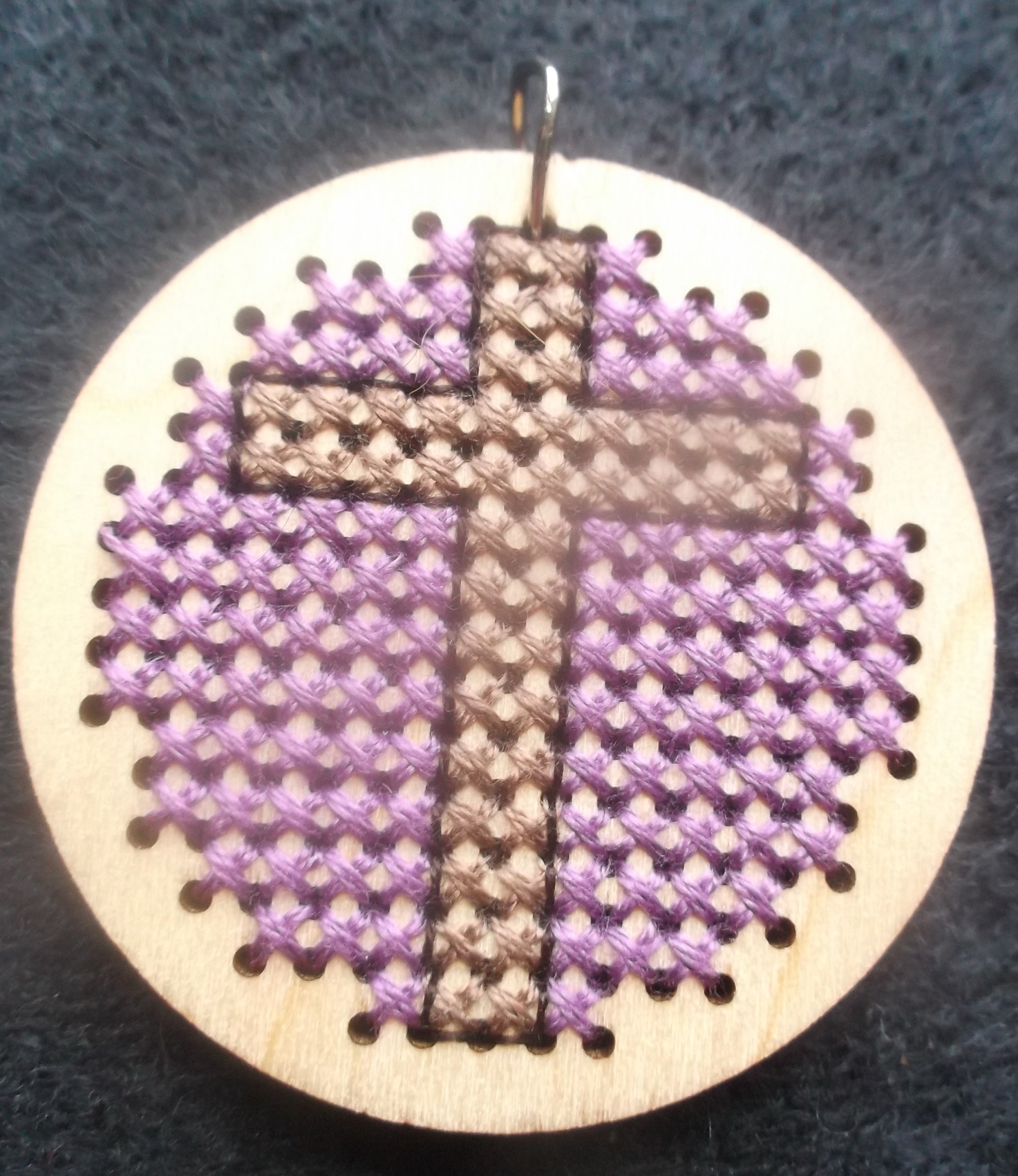 Photo I took of a counted cross stitch pendant that I am getting ready to put into my shop Photo I took of a counted cross stitch pendant that I am getting ready to put into my shop