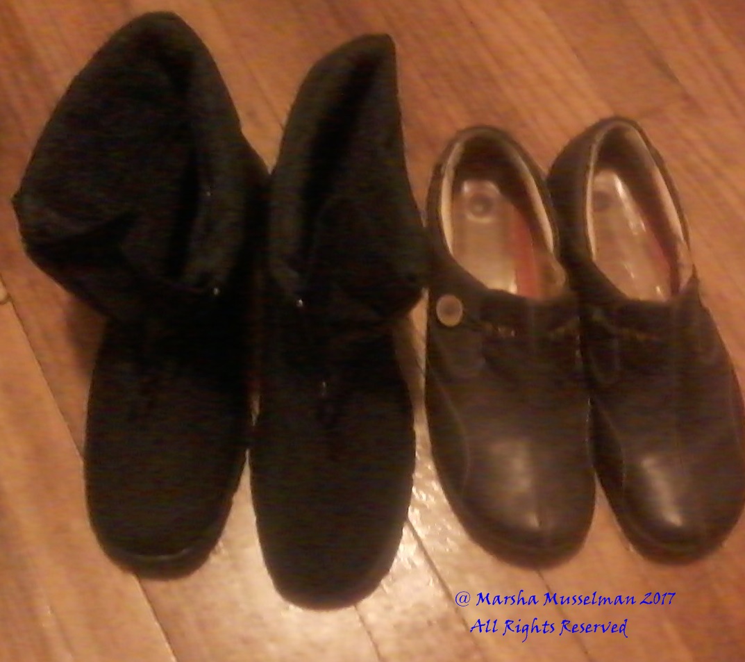 Brown shoes on the right I got years ago, but they&#039;re too small. The boots are new and fit.