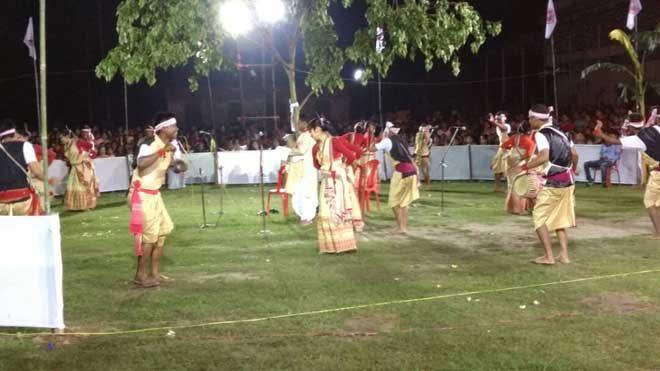 My picture of the Bihu performance in the field opposite my house.