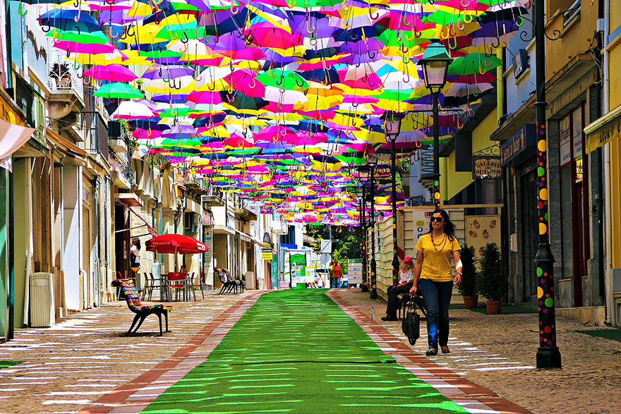 http://www.boredpanda.com/floating-umbrellas-canopy-street-agueda-portugal-2014/ http://www.boredpanda.com/floating-umbrellas-canopy-street-agueda-portugal-2014/