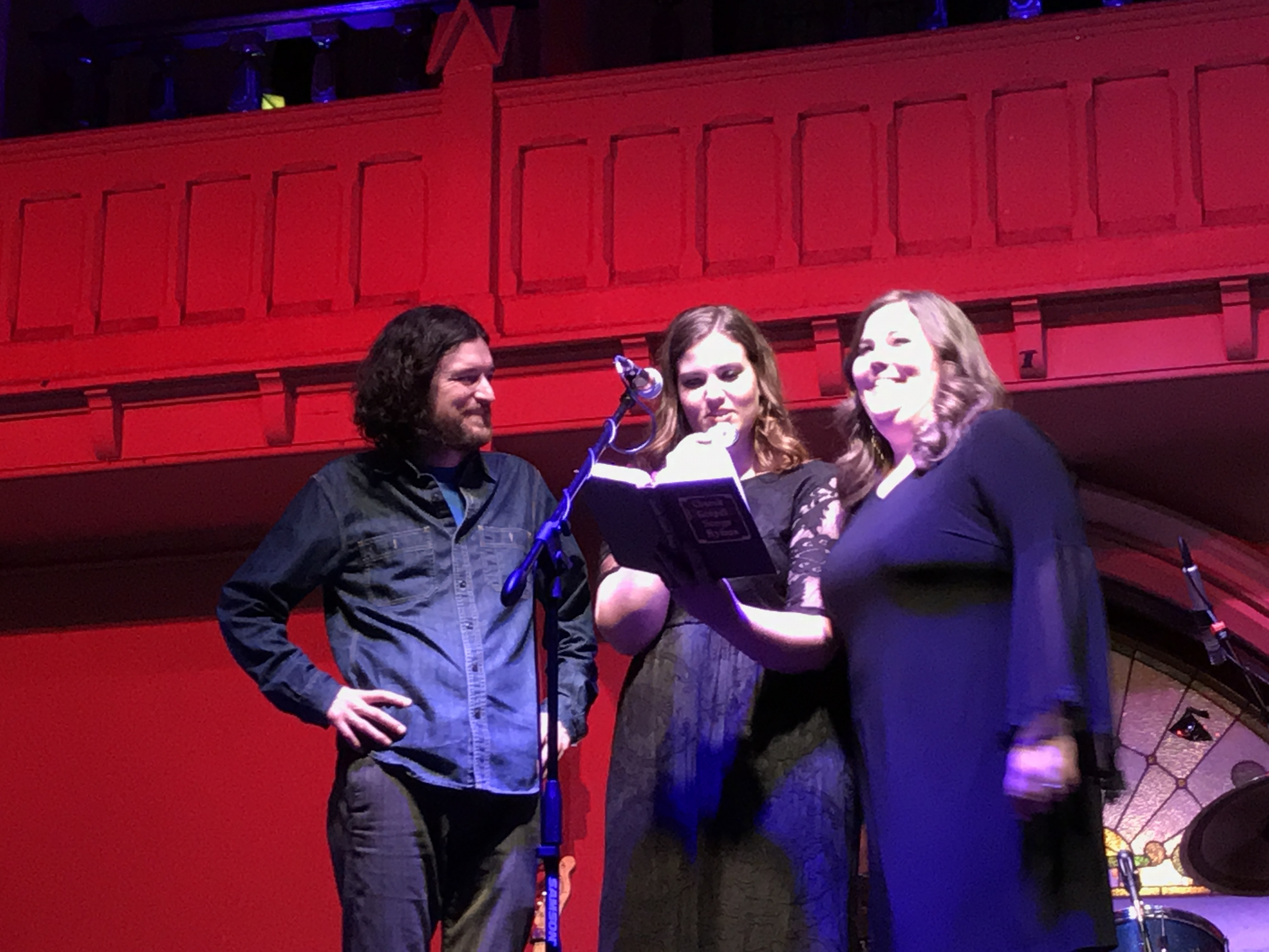 Cheyenne Medders (left), Lydia Rogers (middle), and Laura Rogers (right) singing a cappella harmonies at the conclusion of the show.  Photo taken by and the property of FourWalls.