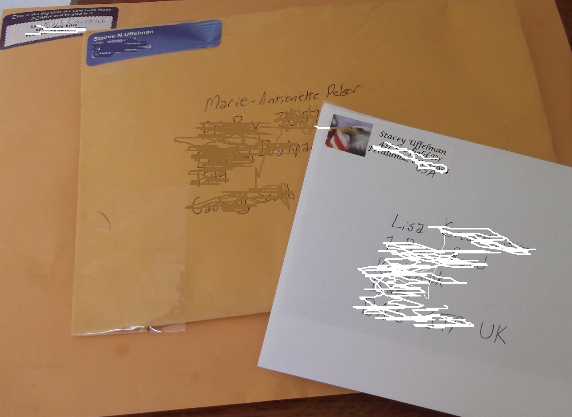 Previous photos I took of packages/letters sent today cropped a bit