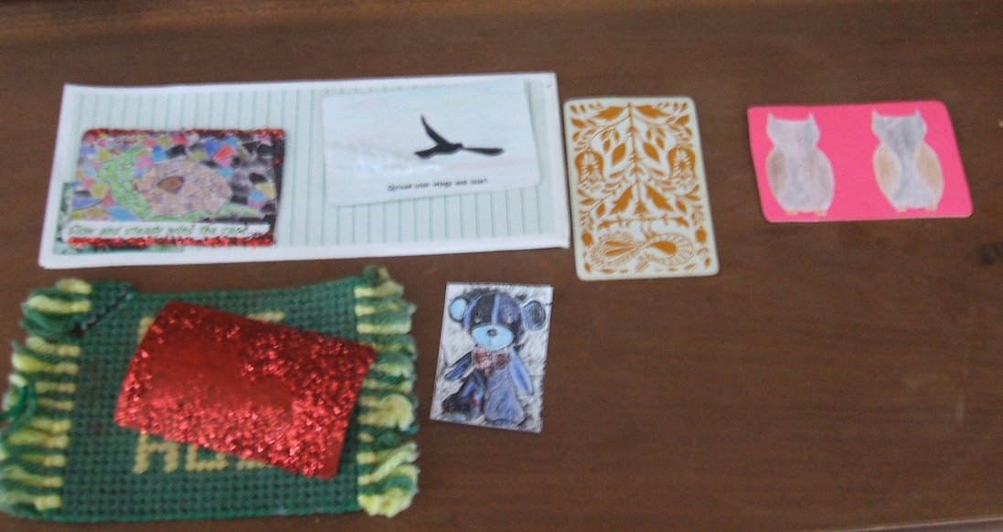 Photo I took of four Artist Trading cards that I am working on in progress Photo I took of four Artist Trading cards that I am working on in progress
