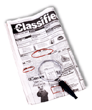 jobs - A newspaper signifying a job search.