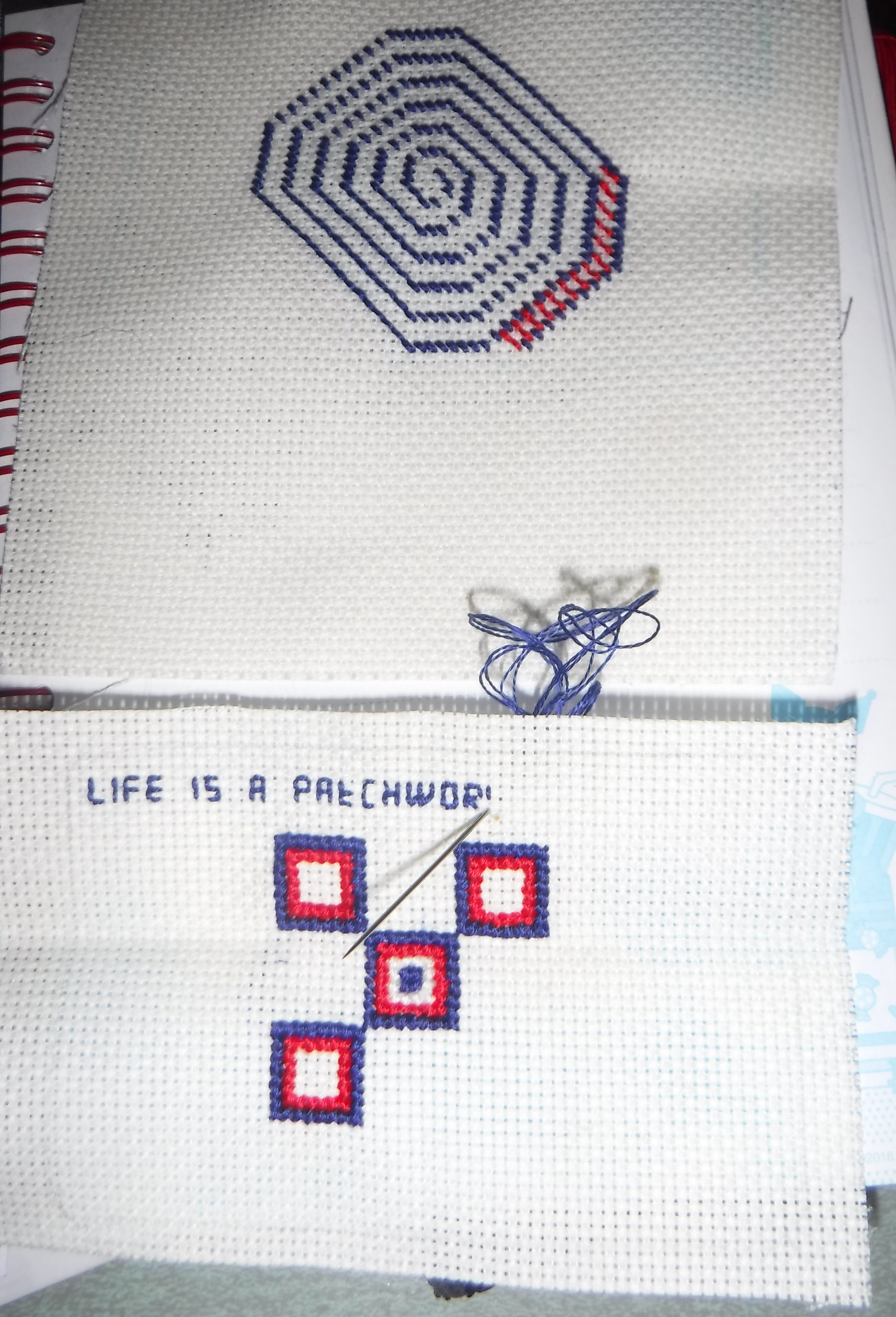 Photo I took of my progress on two Artist Trading Cards I am cross-stitching Photo I took of my progress on two Artist Trading Cards I am cross-stitching