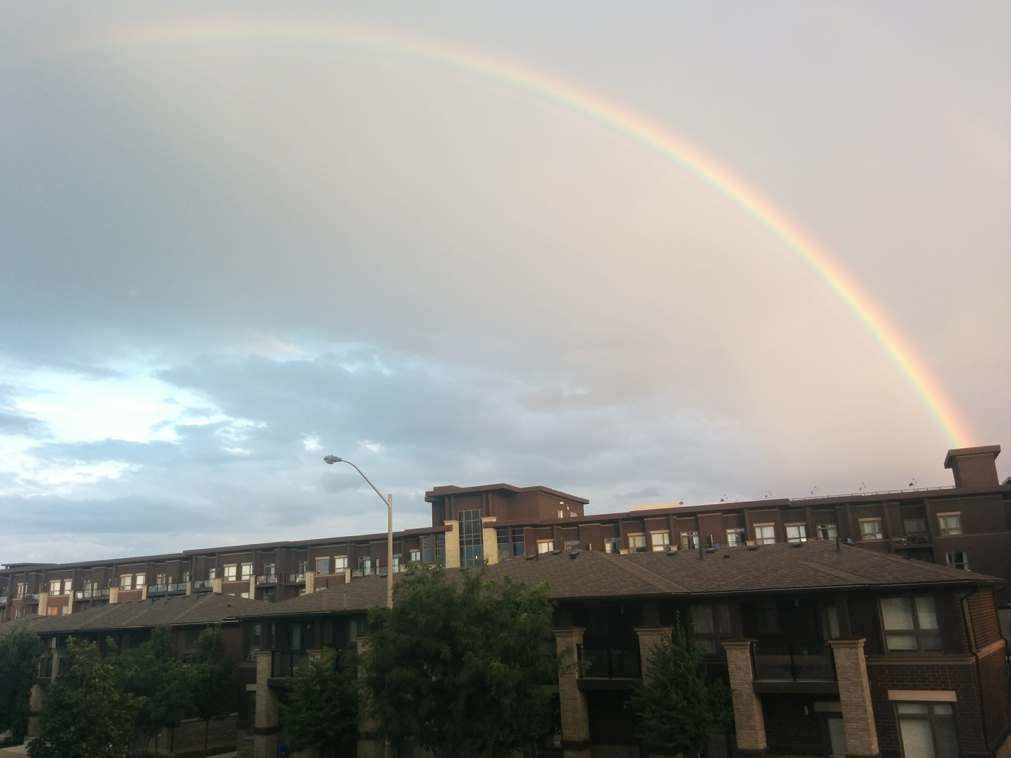 Rainbows in Fall, Rainbows over Bldg. Rainbows are for everyone.