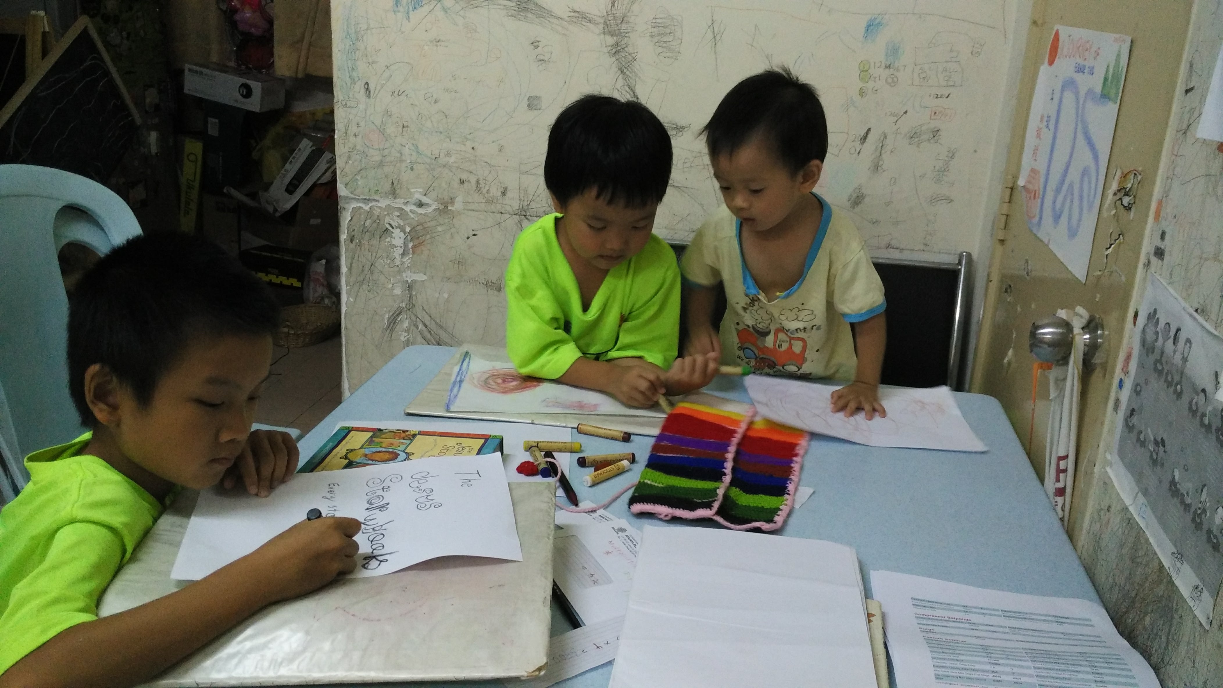 Kids drawing together