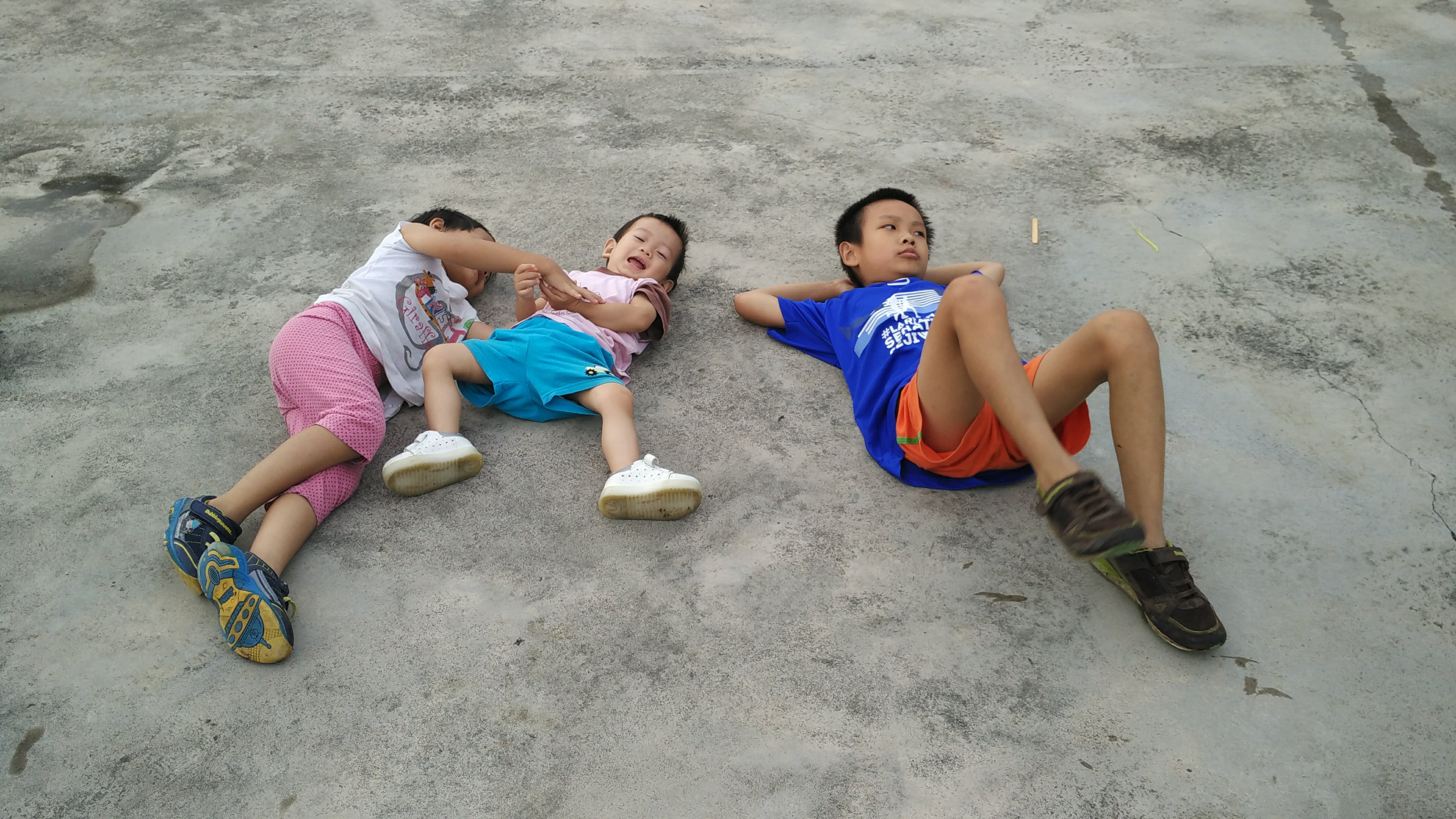 Lying on the ground Lying on the ground