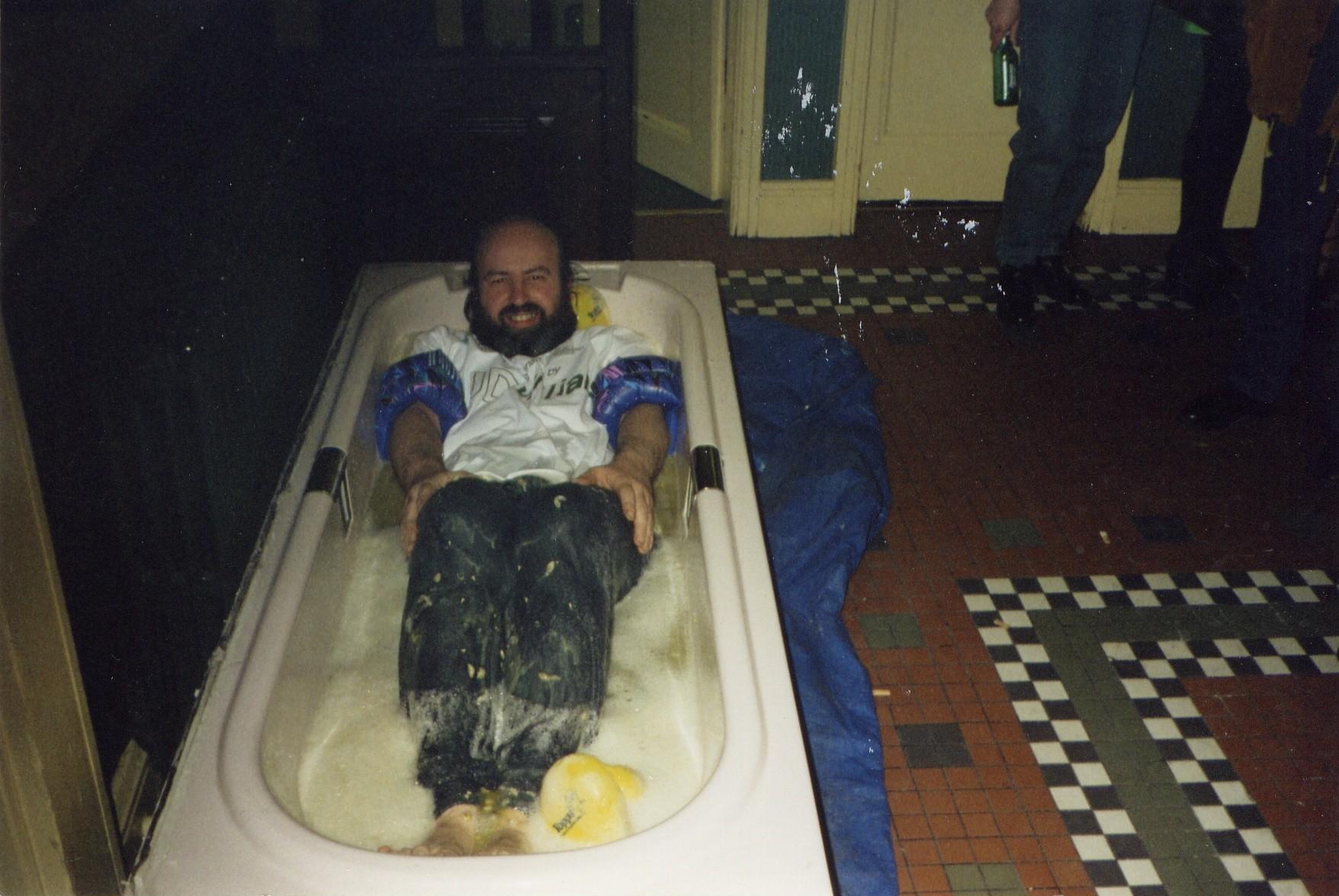 Photo taken by Dave Brock – me in the bath of peas in Manchester 