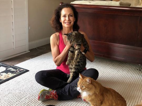 Janice Dimitriou and her cat Turbo reunited