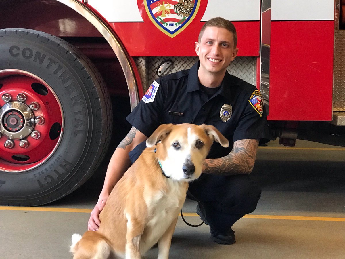 Firefighter in Indiana and Chiquita the dog