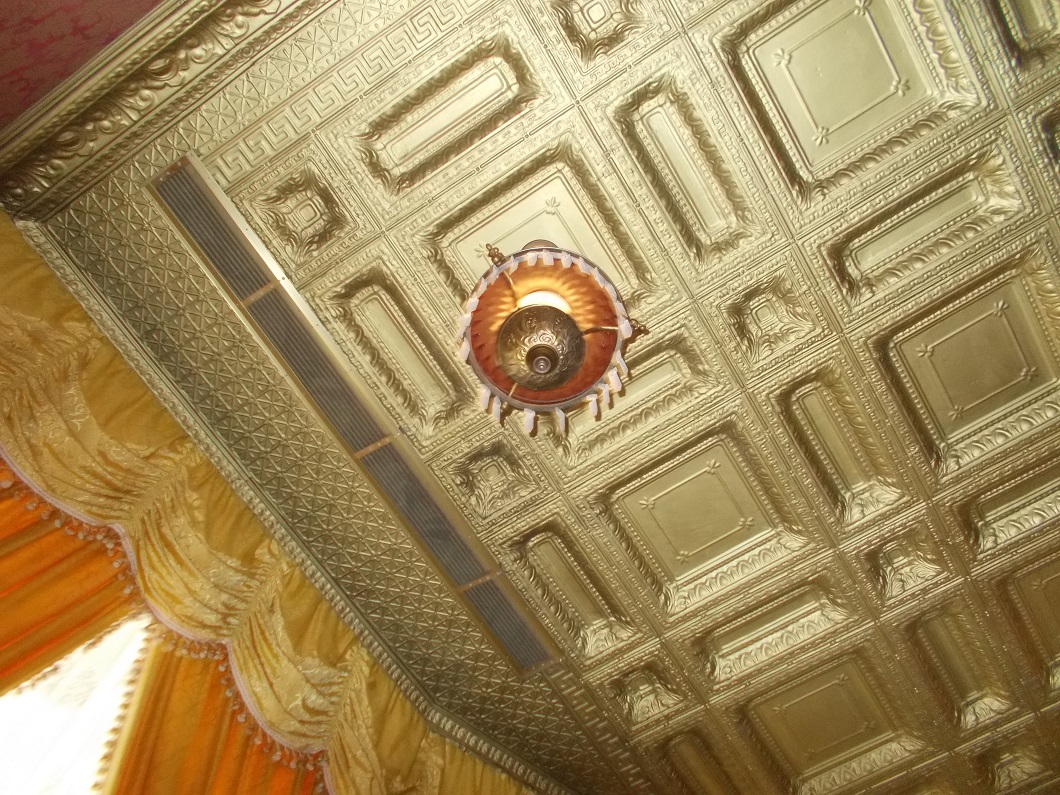 tin ceiling in a restaurant, and glass hanging lamp