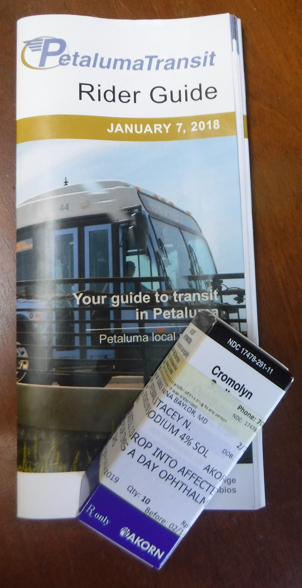 Photo I took of a bus schedule and my eyedrops Photo I took of a bus schedule and my eyedrops