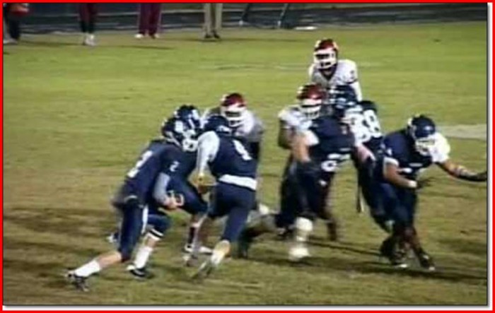 Shawnee High School football team doing charity work after a storm hit the area