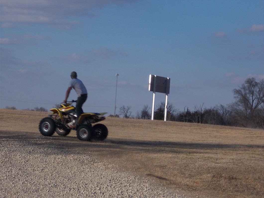 kid on an atv kid on an atv