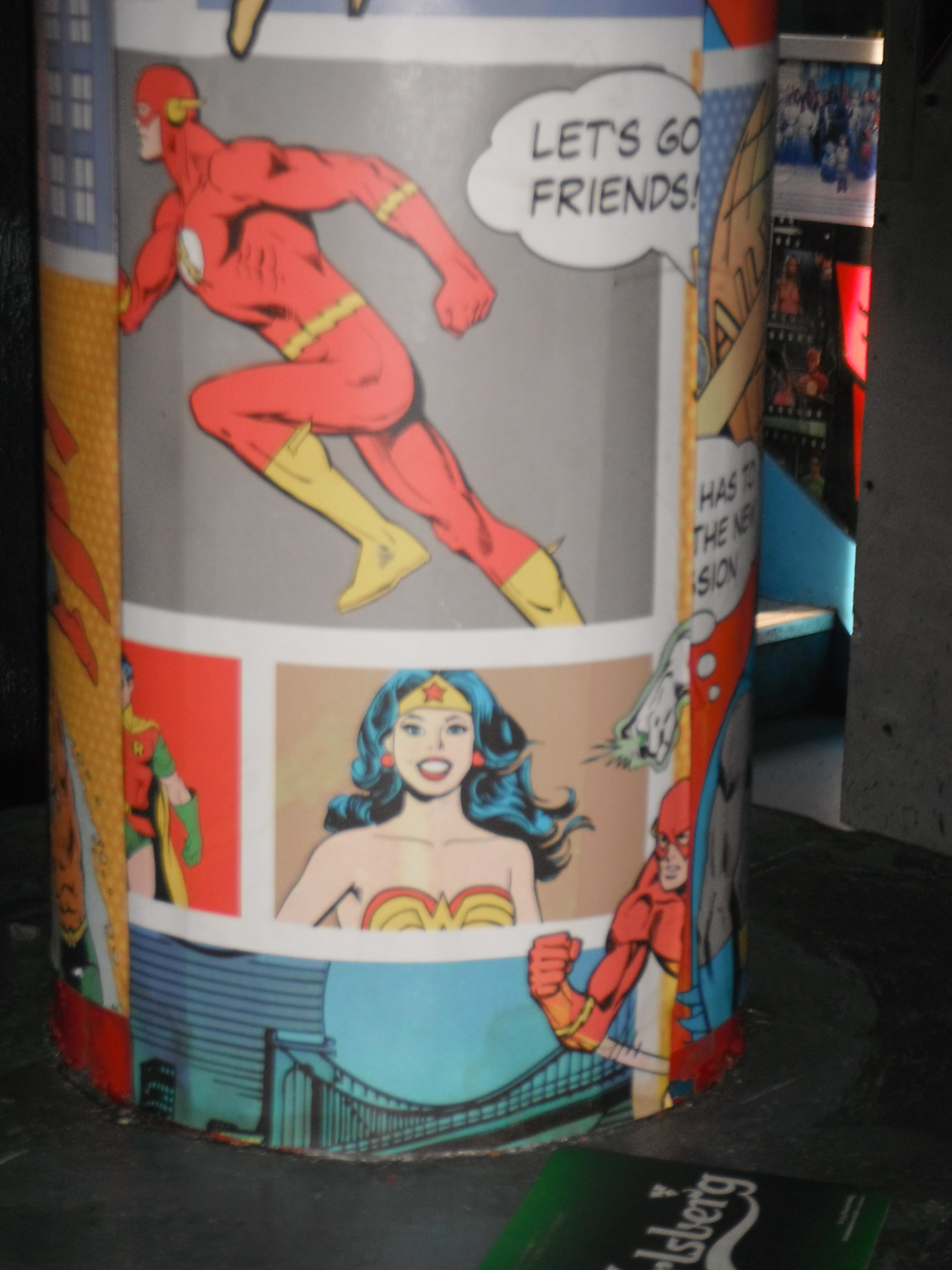 Photo taken by me - Comic book covers on a pillar in FAB Cafe Manchester 