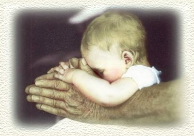 child praying - i like this photo..a child praying in the hands of an elderly.it reflects a family value that must be continued in this fearless and Godless society. i think its an innocent granchild in his lolo (filipno word for grandpa) who is also praying that somehow someday this child will be what God wants him to be.