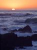sun on rocks - sun setting on rocks