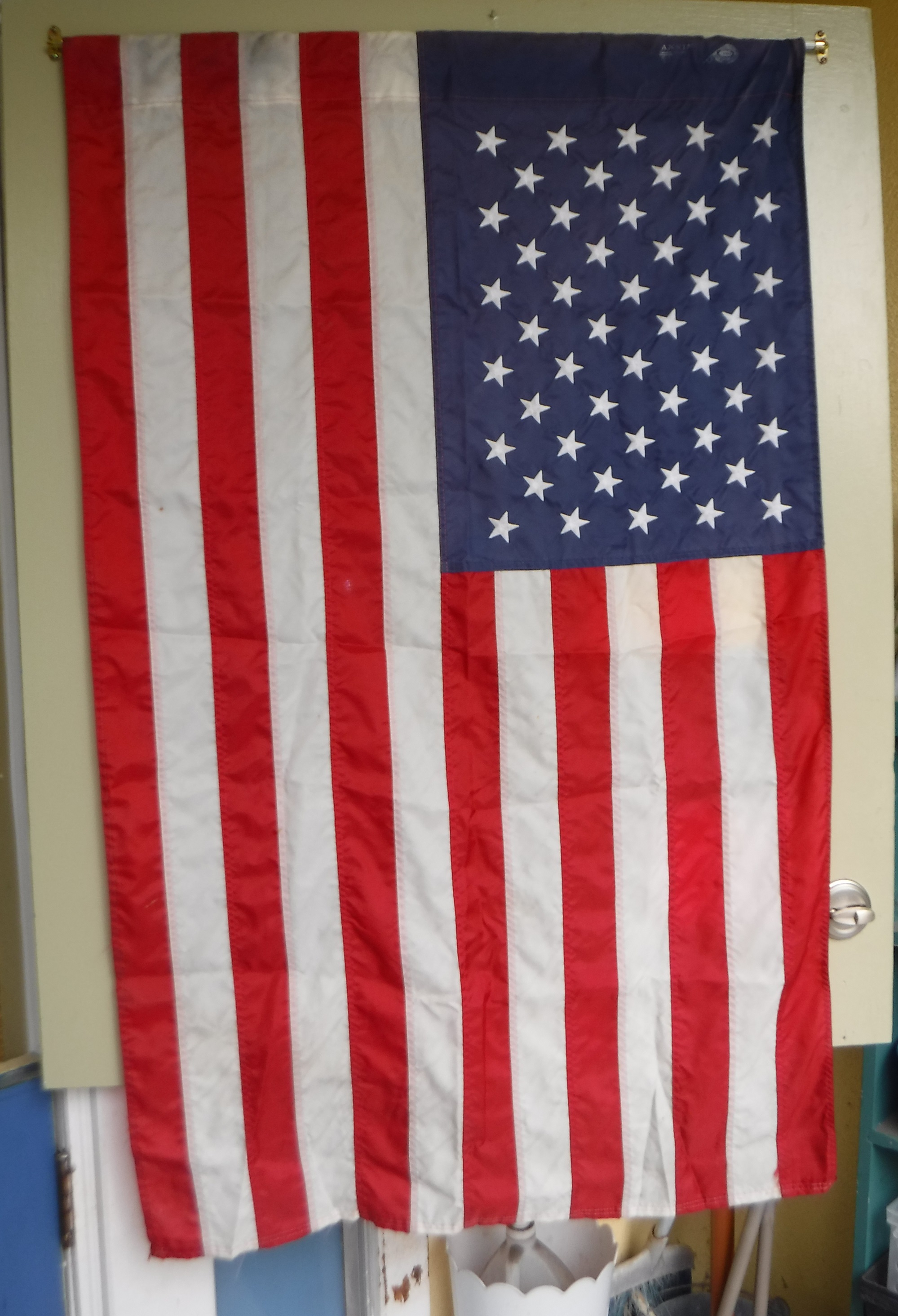 Photo I took of the flag banner hanging on the door at work